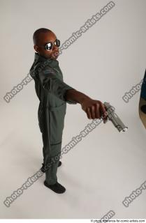 23 2018 01  ERIC PILOT STANDING POSE WITH GUNS